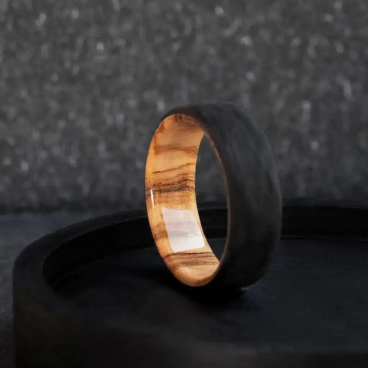 Handmade Carbon Fiber and Olive Wood Wedding Ring.