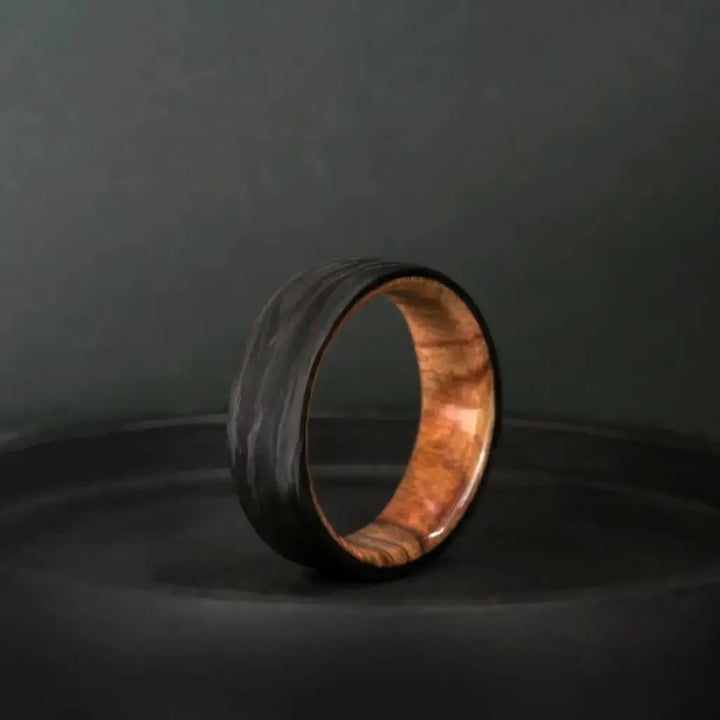 Carbon Fiber Ring with Splated Maple Wood.